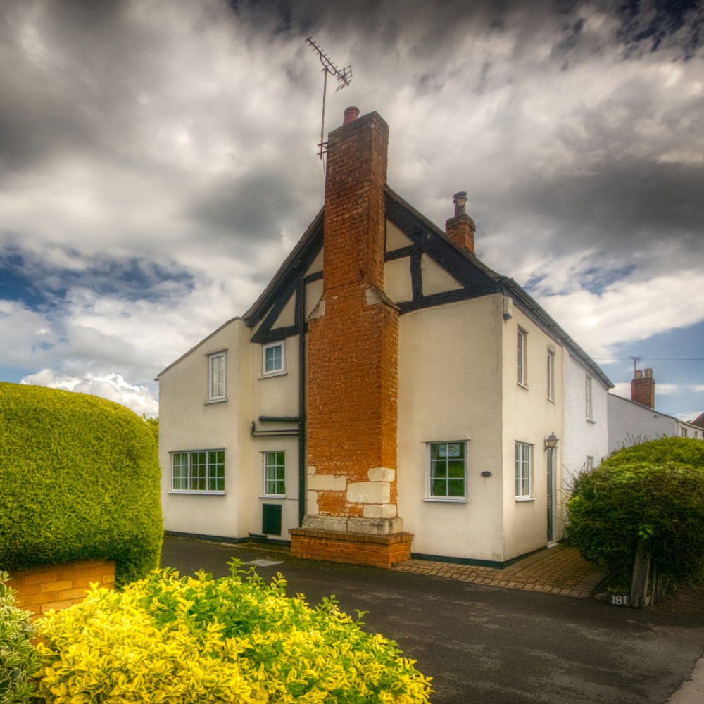 Nos. 181–183 Barnwood Road, originally a farmhouse built in the mid to late 16th century.