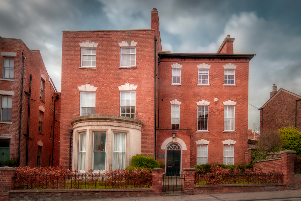 Bastion House, No. 26 Brunswick Road, built c.1820 with wing added slightly later and bow window added to ground floor of wing late-19th century.