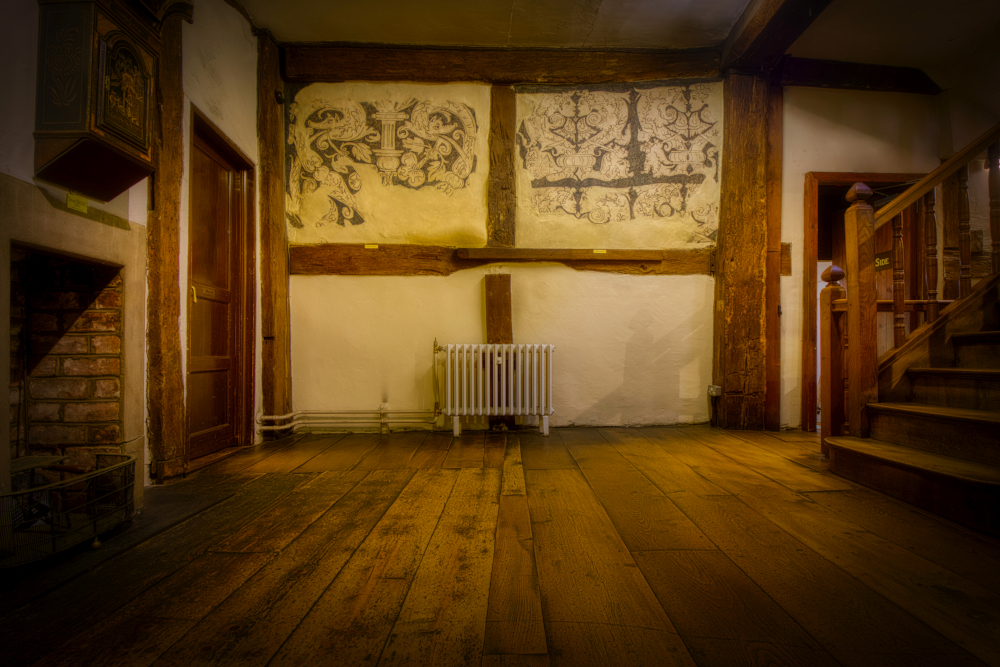 Timber framing and internal wall painting at the Folk of Gloucester