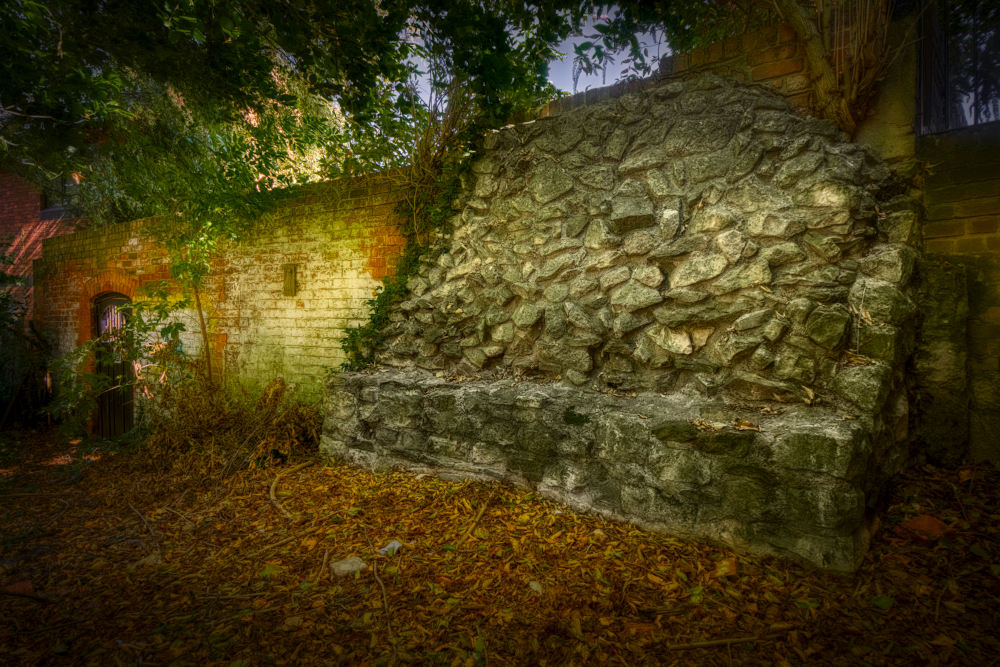 Section of abbey precinct wall in St. Lucy's Garden just off Hare Lane