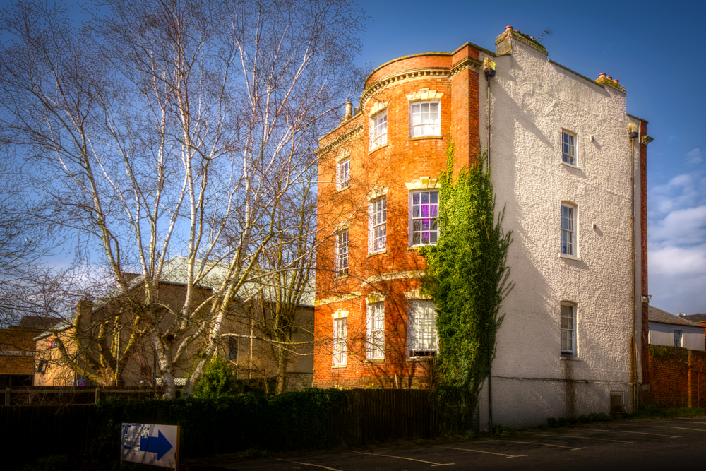Rear of 19th-century No. 72 Eastgate Street, the bow windows betraying the wealth and elegance that once characterised lower Eastgate Street