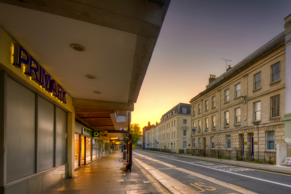 19th-century Nos. 8–12 Clarence Street with Nos. 18–30 beyond