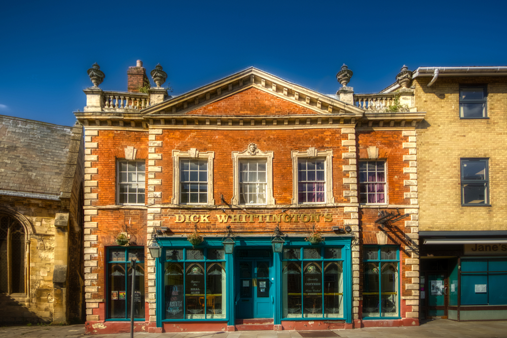 Originally 15th-century merchant's house, re-fronted in brick c.1725, converted to Dick Whittington's pub 1980s.